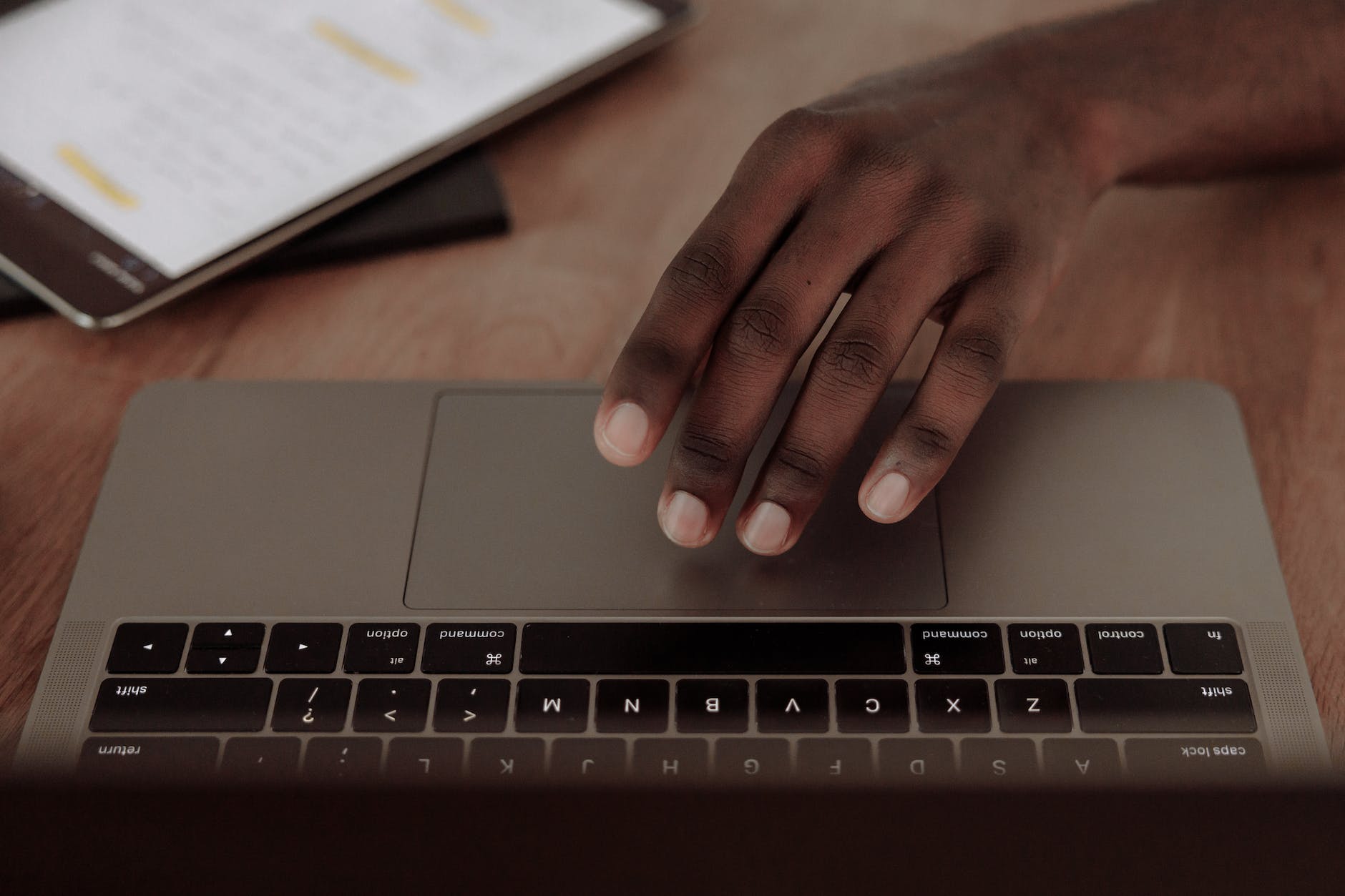 Photo by Thirdman on <a href="https://www.pexels.com/photo/person-s-hand-on-silver-laptop-computer-5592598/" rel="nofollow">Pexels.com</a>